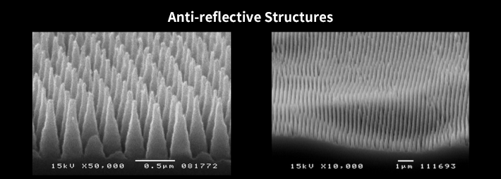 Electron microscope image of an antireflective structure. The structure is shown as a uniform array of microscopic sharp projections.