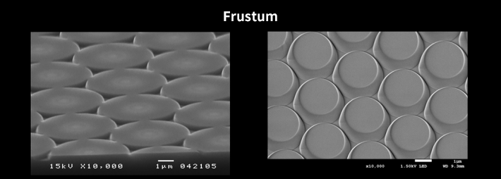 Electron microscope image of a conical conical structure. It shows a microstructure of overlapping conical protrusions.