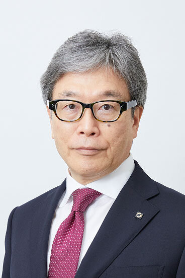 Photo of the face of Satoshi Takuma